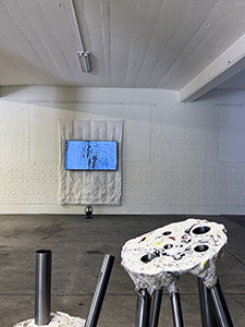 Richard Blaško, Dutina, 2025. Video installation, exhibition view. In the foreground, Maya Bringolf